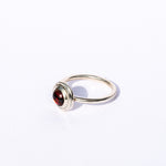 sterling silver ring with garnet gemstone