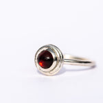 sterling silver ring with garnet gemstone