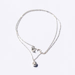 necklace with sphere pendant on silver chain