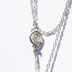 spiral pendant on silver chain