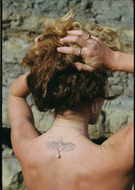 model wearing silver jewelry