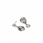 spiral asymmetrical earrings
