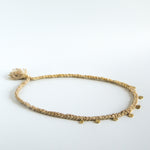 Yellow silk braid necklace with seven circle pendants