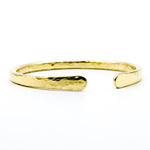 brass hand forged heavy gauge cuff on white background