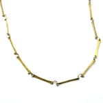 brass silver chain necklace close up
