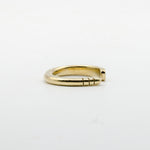 hand forged brass ring with three notches