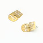 cutout brass sheet dangle earrings on white background