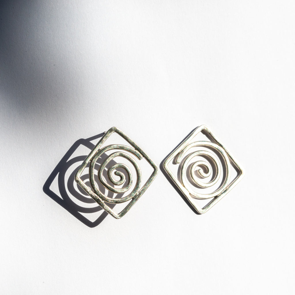 spiral statement earrings