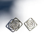 spiral statement earrings