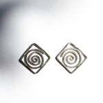 spiral statement earrings