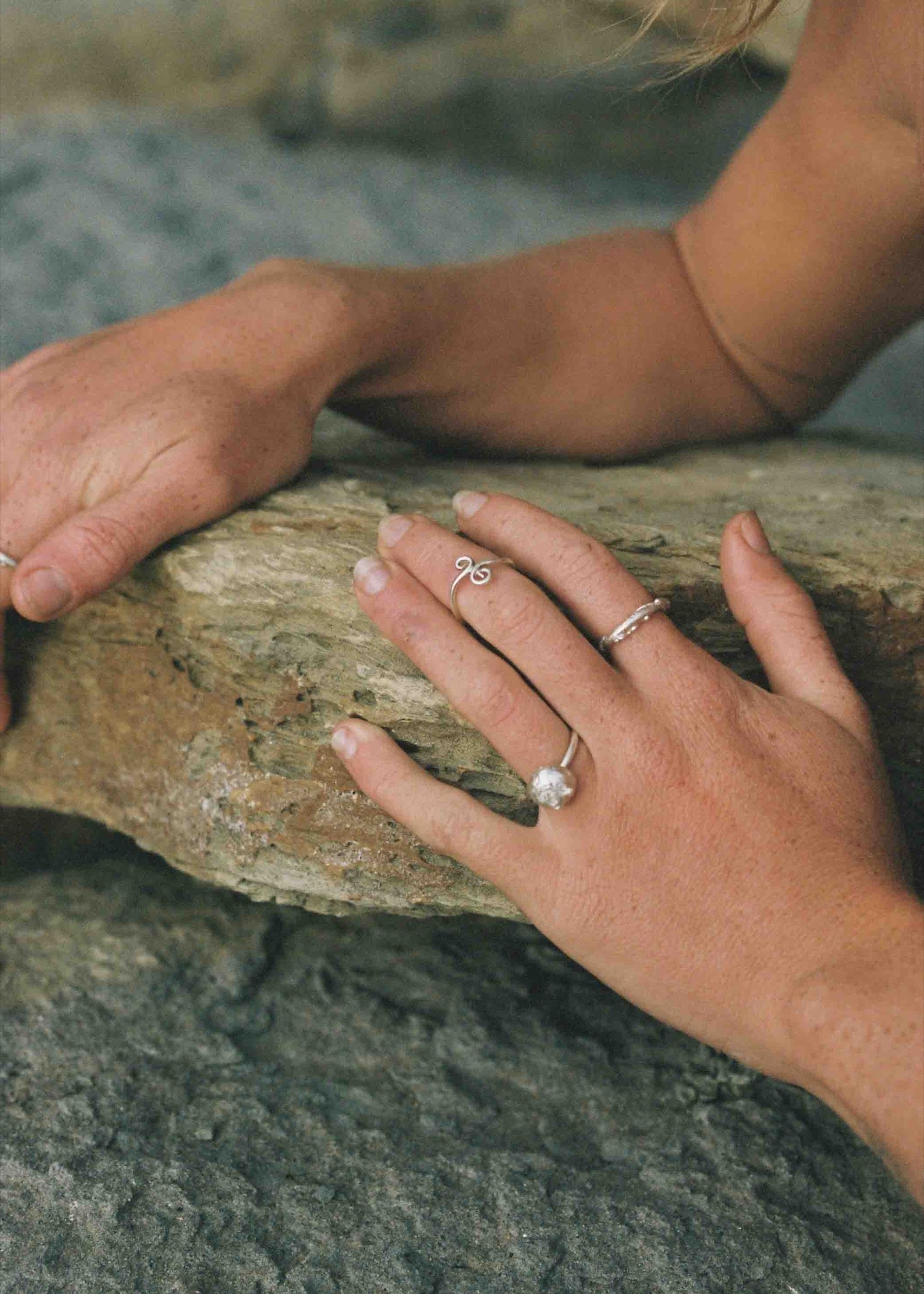 model wearing silver rings