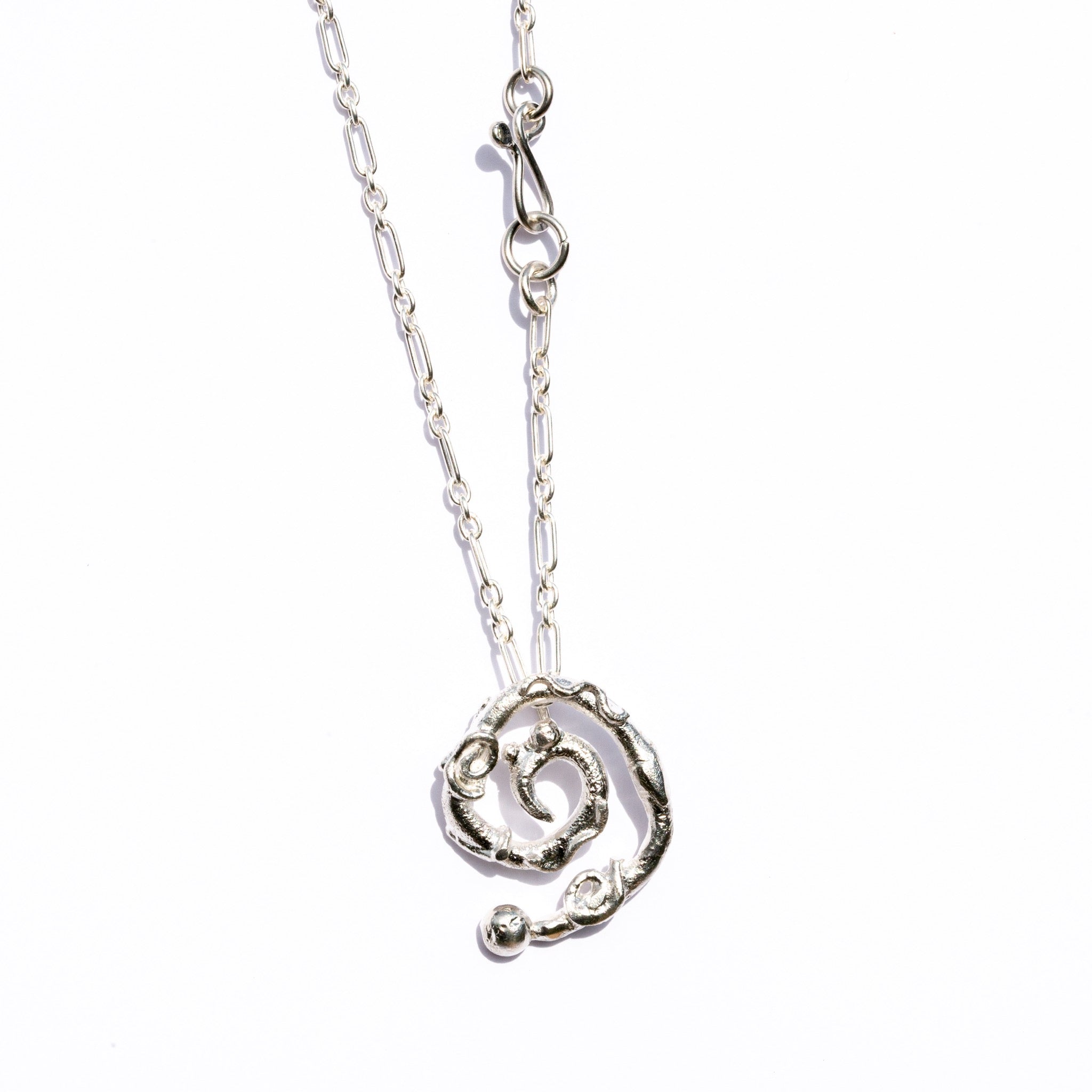 spiral pendant on silver chain