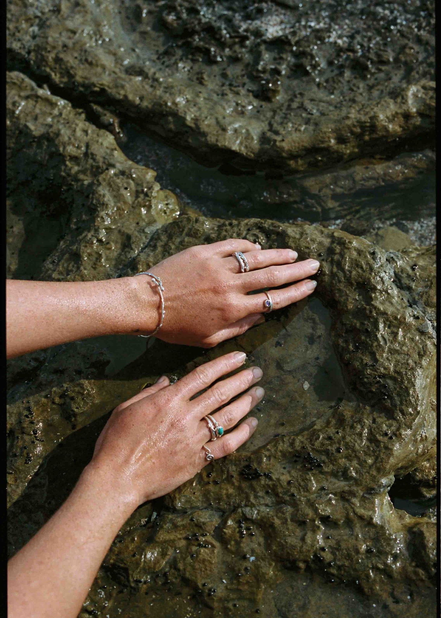 model wearing silver rings