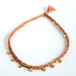Orange silk braid necklace with seven circle pendants