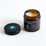 body butter in amber glass pot without lid