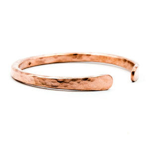 copper hand forged heavy gauge cuff on white background