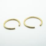 thick brass cuffs front view on white background, sizes small and big