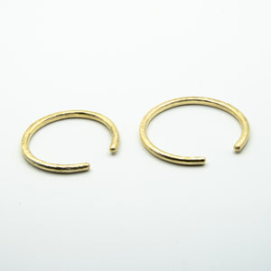 thick brass cuffs front view on white background, sizes small and big