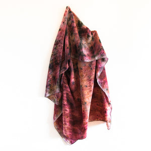 front view of hanging silk scarf. eco dyed pink, red and purple