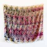 front view of open silk scarf with an eco dye pattern all over