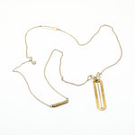 top view of brass cutout pendant necklace