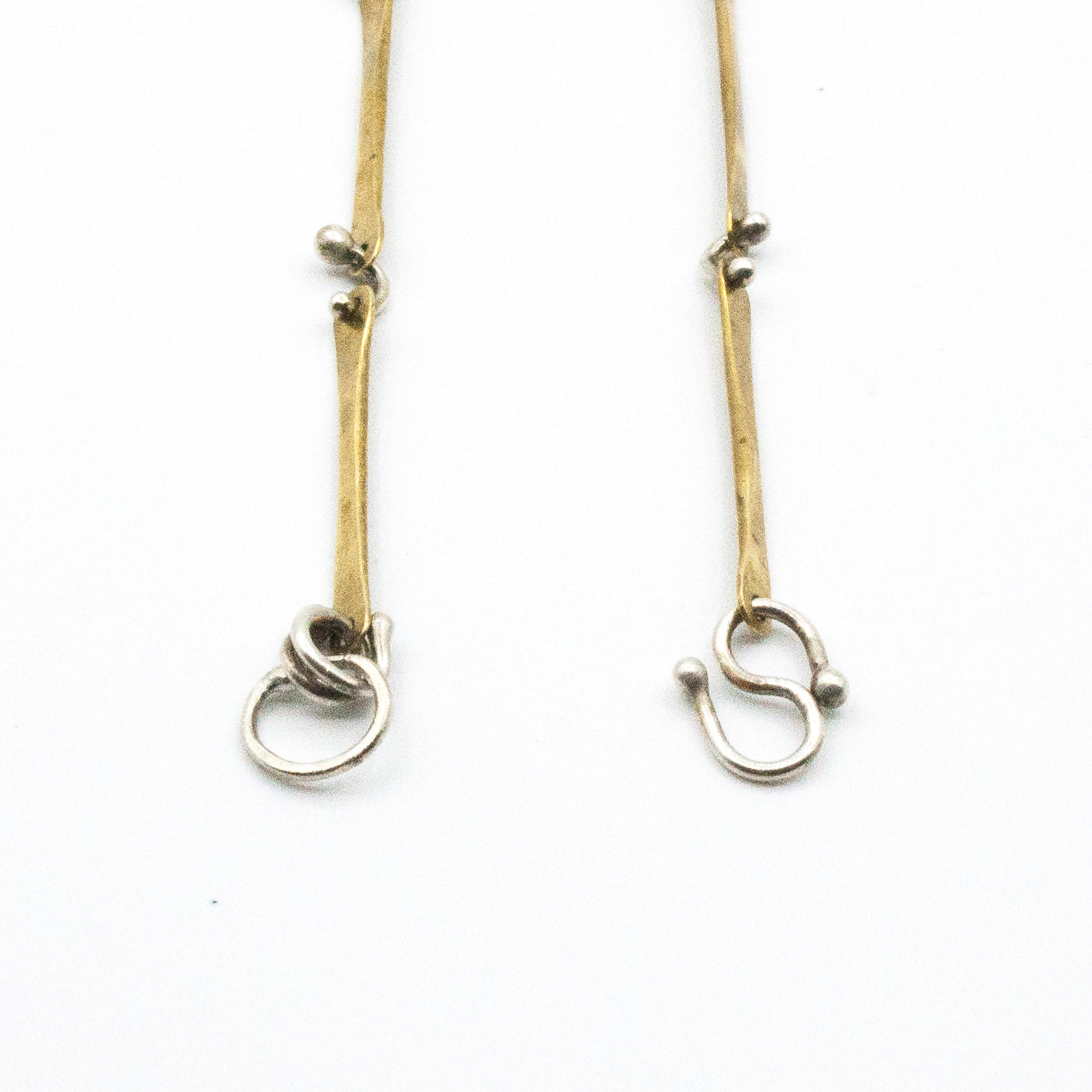brass and silver wire clasp