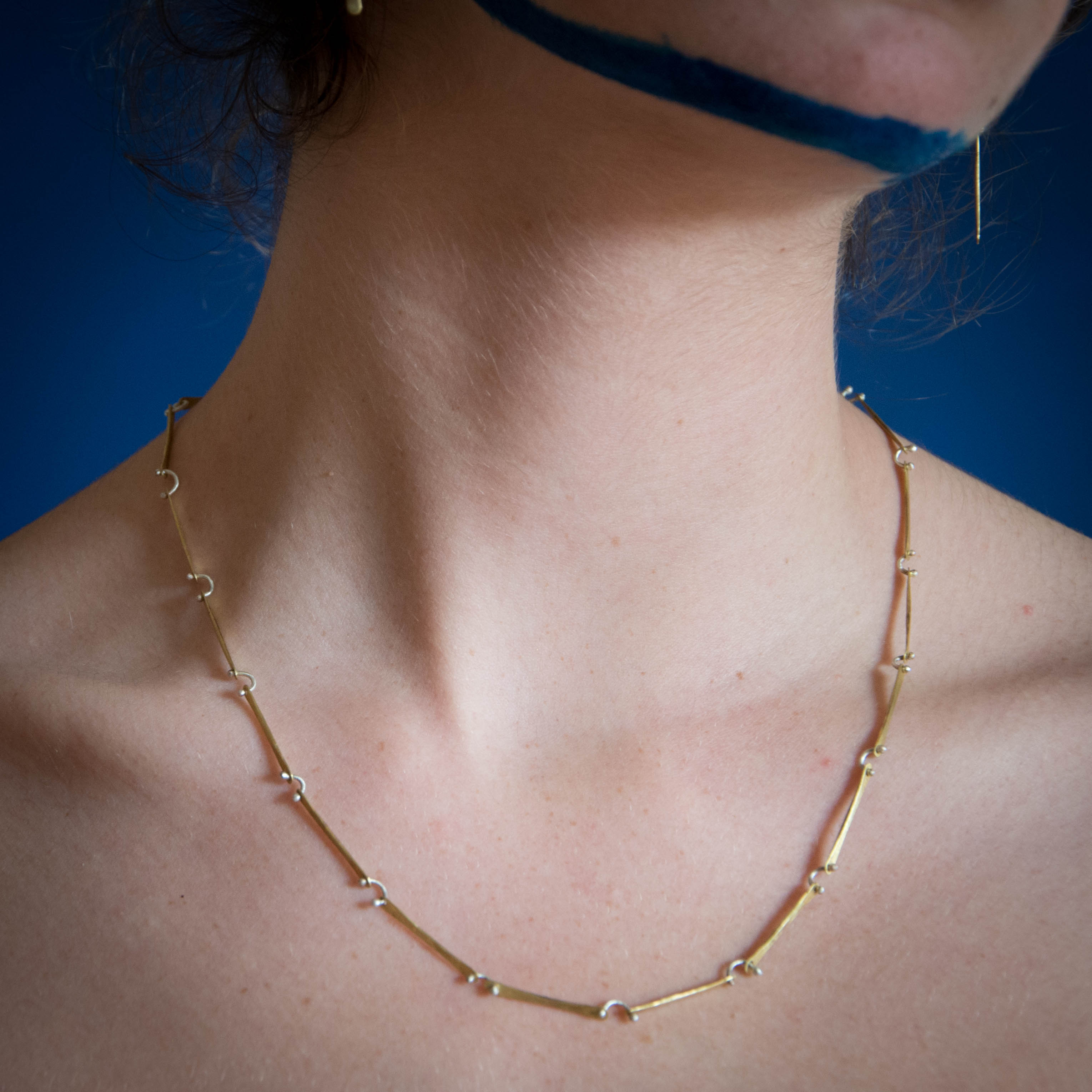brass silver chain necklace on model